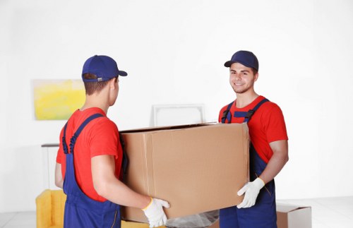 Local movers loading belongings for a home move in Lee