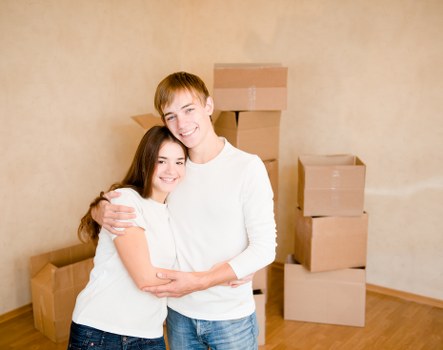 Staff carrying furniture with proper lifting technique