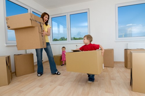 Furniture and boxes being moved safely by local movers in Lee