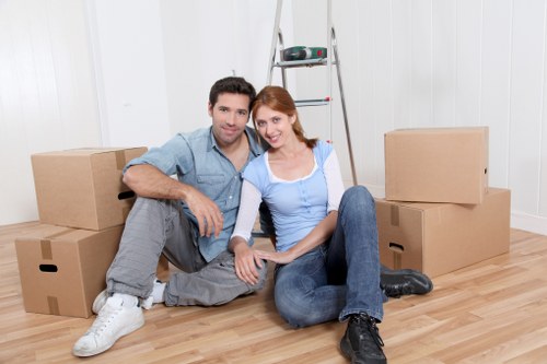Local office movers handling desks and filing cabinets